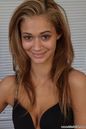 18 year old girl Barbie Bree strips to pink leg warmers in her bedroom